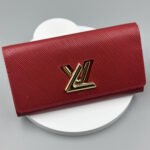 Louis Vuitton Red Epi Leather Twist Wallet - Gold