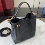 Gucci GG Emblem Small Bucket Bag GG Print Embossed Leather - Black - Image 6