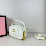 Miu Miu Logo Patch Zipped Clutch Bag - Image 4