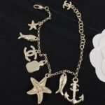 Chanel Gold Crystal Pendant with Multiple Accessories Starfish Anchor Fish Bracelet - Image 6