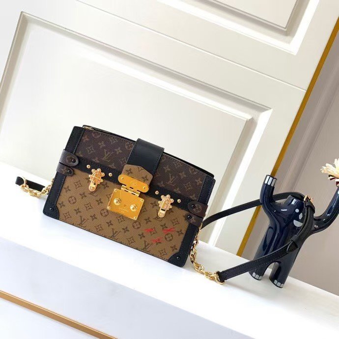 4970a92238037ad62ba67410a1412991 LOUIS VUITTON Pochette Trunk Cloth Clutch Bag Brown - Bag - Image 1