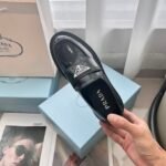 PRADA Glossy Patent Leather Triangle Labeled Loafers - Image 8