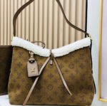 Louis Vuitton CarryAll Small Clutch Bag
