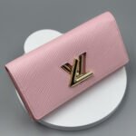 Louis Vuitton Pink Epi Leather Twist Wallet - Golden