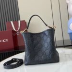 Gucci GG Emblem Small Bucket Bag GG Print Embossed Leather - Black - Image 4