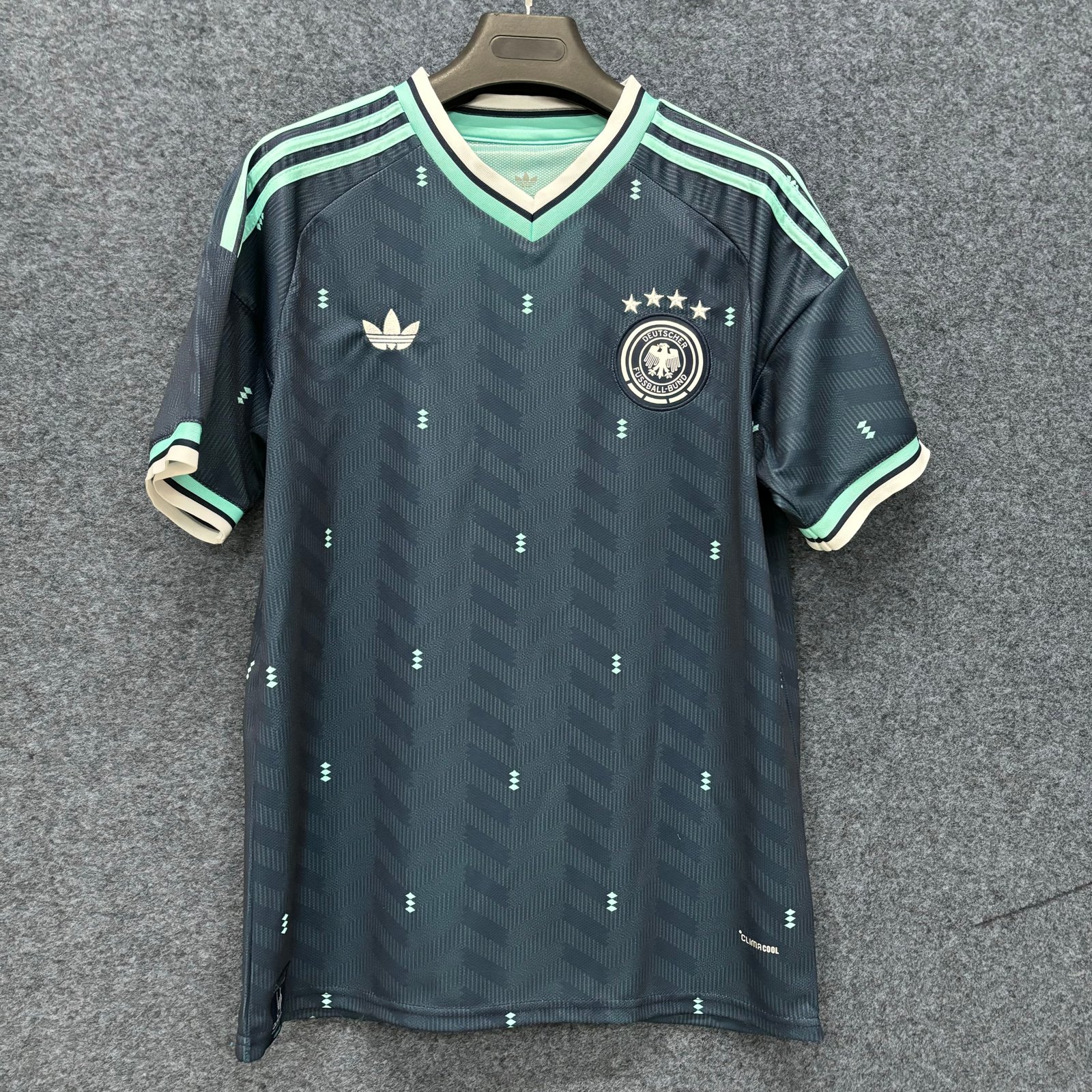 6c4c4cbd488e269f32995a861fc64a27 2026 Germany World Cup Away Fan Version Football Jersey - Image 1