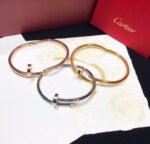 Cartier 18K Gold Nail Bangle Bracelet - Accessories