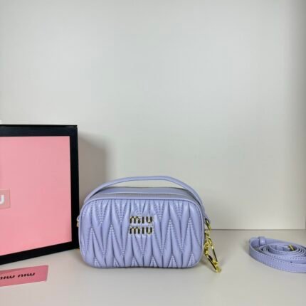 Miu Miu Logo Patch Zipped Clutch Bag