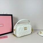 Miu Miu Logo Patch Zipped Clutch Bag - Image 3