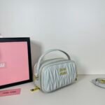 Miu Miu Logo Patch Zipped Clutch Bag - Image 2