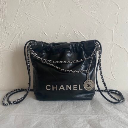 CHANEL 22 MINI HANDBAG Shiny Calfskin & Silver-Tone Metal Black - Bag
