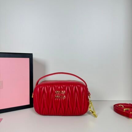 Miu Miu Logo Patch Zipped Clutch Bag