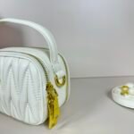 Miu Miu Logo Patch Zipped Clutch Bag - Image 8