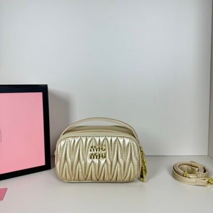 Miu Miu Logo Patch Zipped Clutch Bag