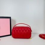 Miu Miu Logo Patch Zipped Clutch Bag - Image 3