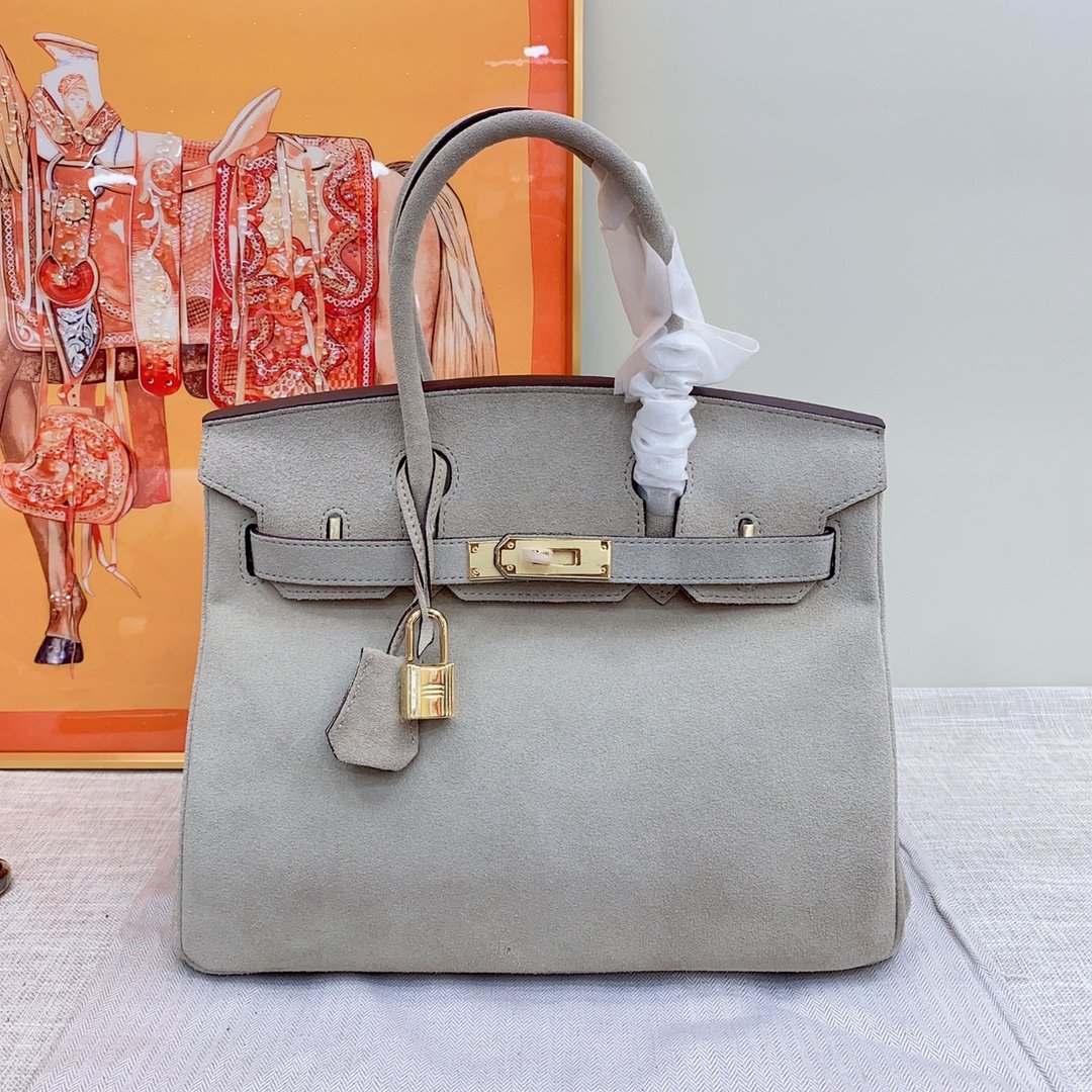 a127fb9e3bc81a4a438a5a072ddabd56 Hermes Birkin Bag Doblis Bag Golden Hardware-Grey Bag - Image 1