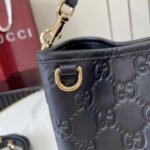 Gucci GG Emblem Small Bucket Bag GG Print Embossed Leather - Black - Image 8
