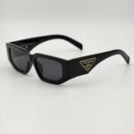 PRADA Sunglasses with triangle logo - Accessories